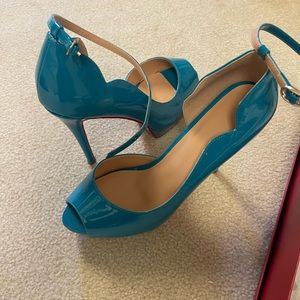 Teal high heels.